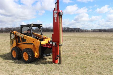 skid steer mounted post driver plate|skid steer post driver price.